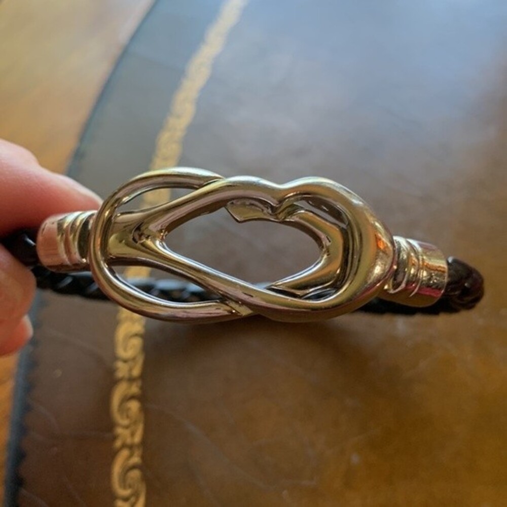 Black woven bracelet with magnetic heart clasp